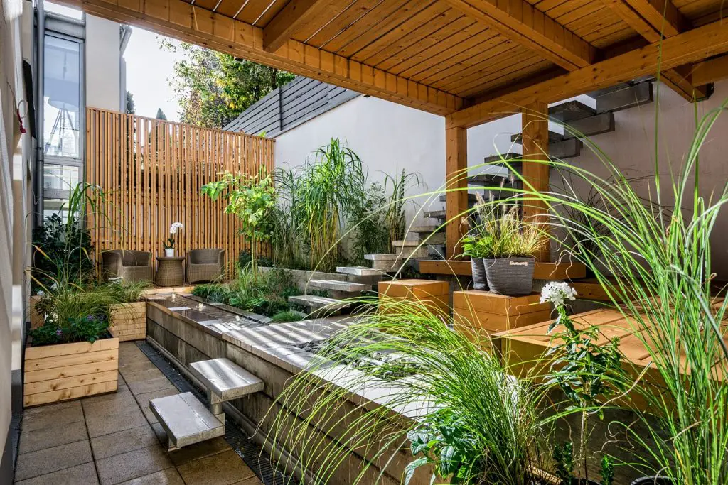 Enhance your patio with plants to increase privacy.