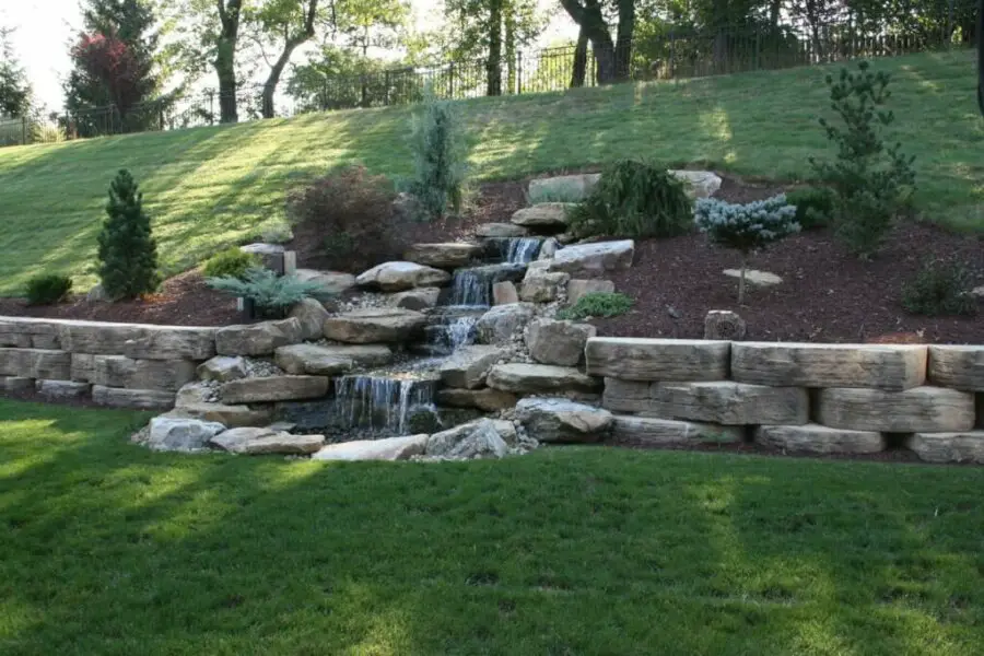 sloped backyard waterfall